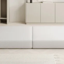 Beistellhocker Lazy In Bouclé -Safety Gear World Baidani 25 03 29 Omhu sofa Pouf front function Quelle 01